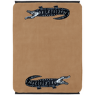 brown and black alligator rug