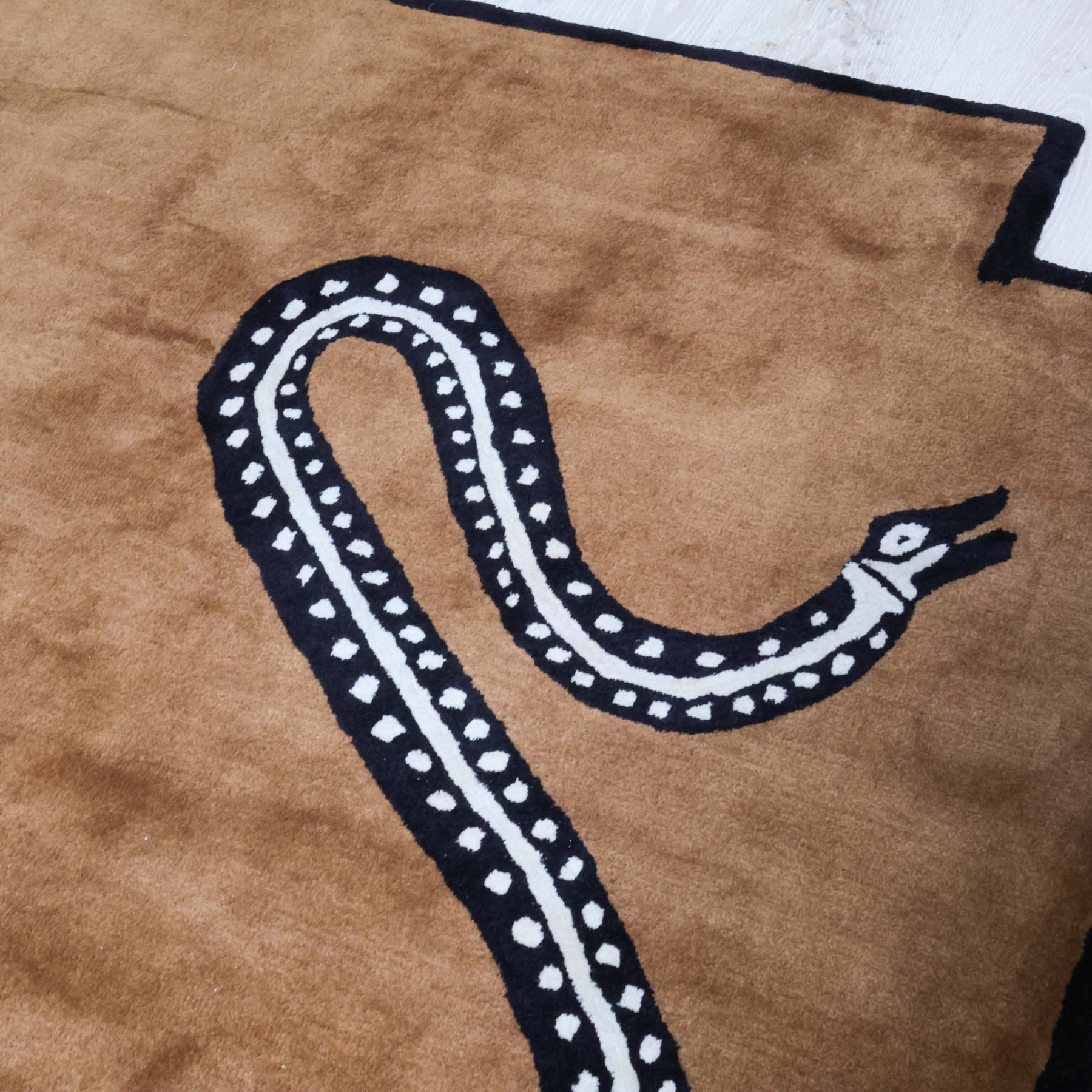 Viper Saddle Tufted Knot Rug | Brown Snake Rug – Scout Design Studio