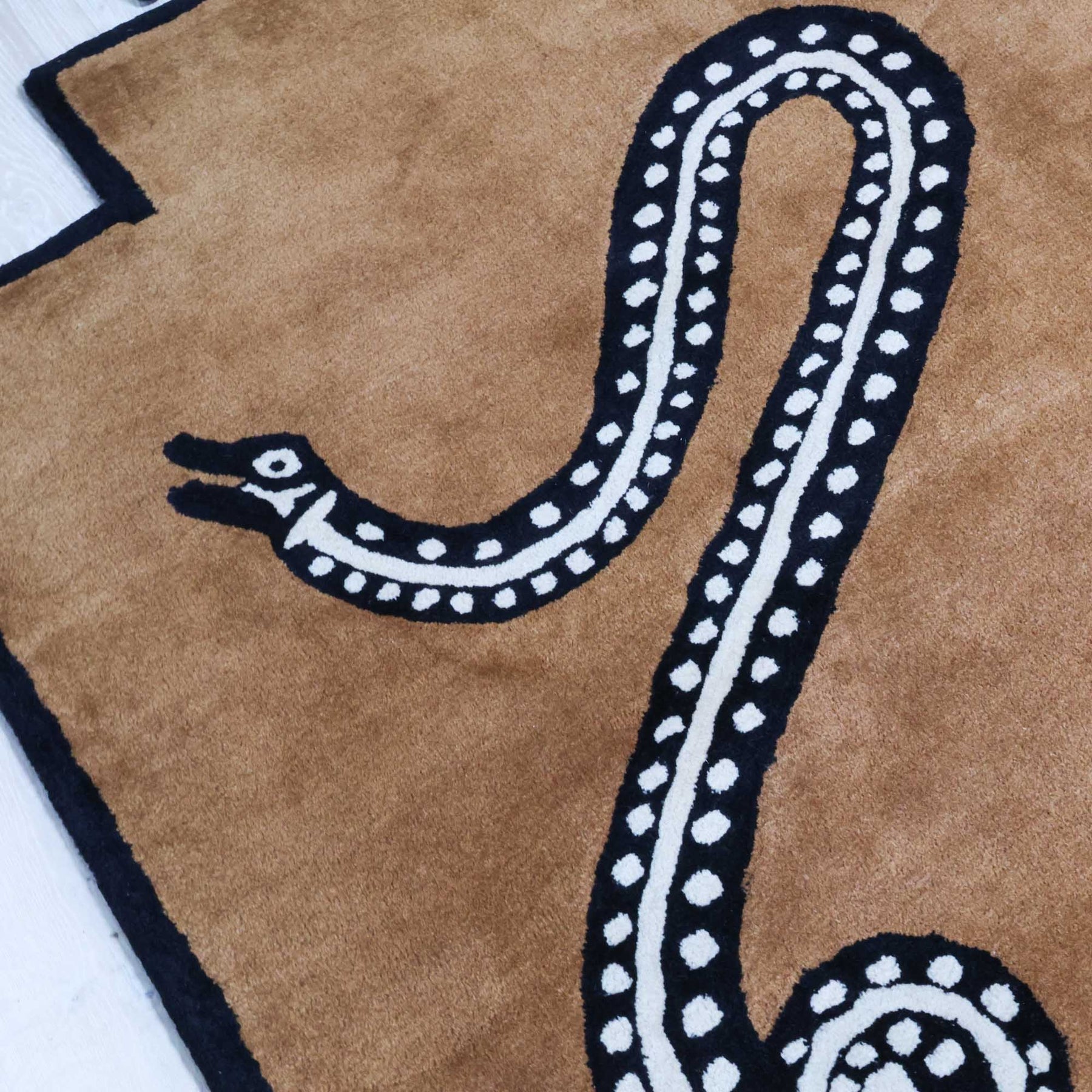 Viper Saddle Tufted Knot Rug | Brown Snake Rug – Scout Design Studio